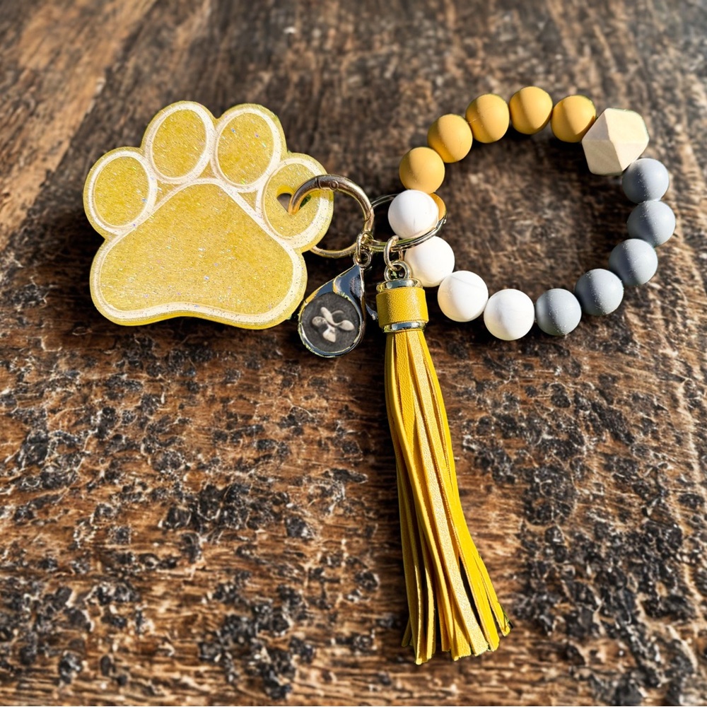 Yellow Paw Print Keychain with Tassel